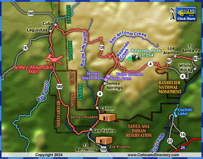 Rider on NM 4 through Jemez Mountain landscape