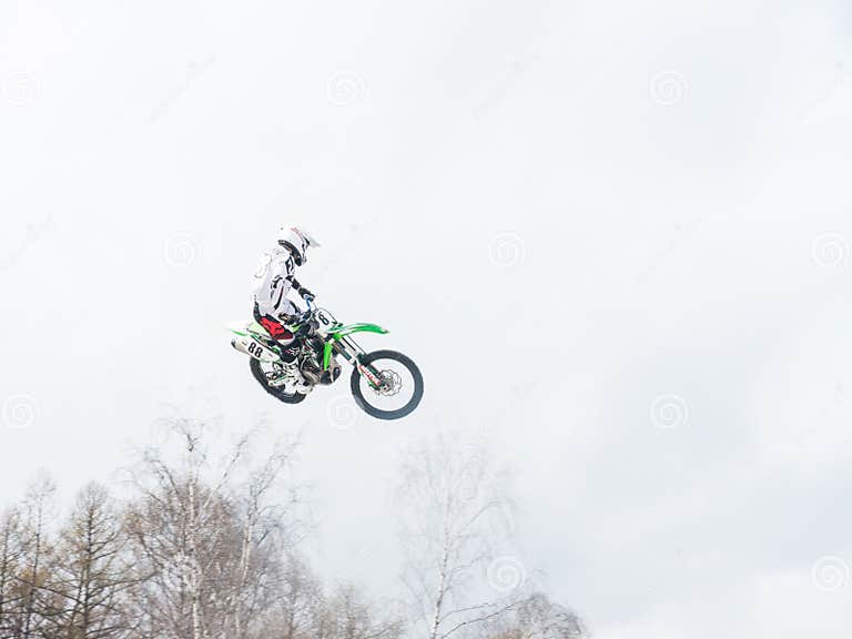 Young rider in 250SX class showing style over a jump