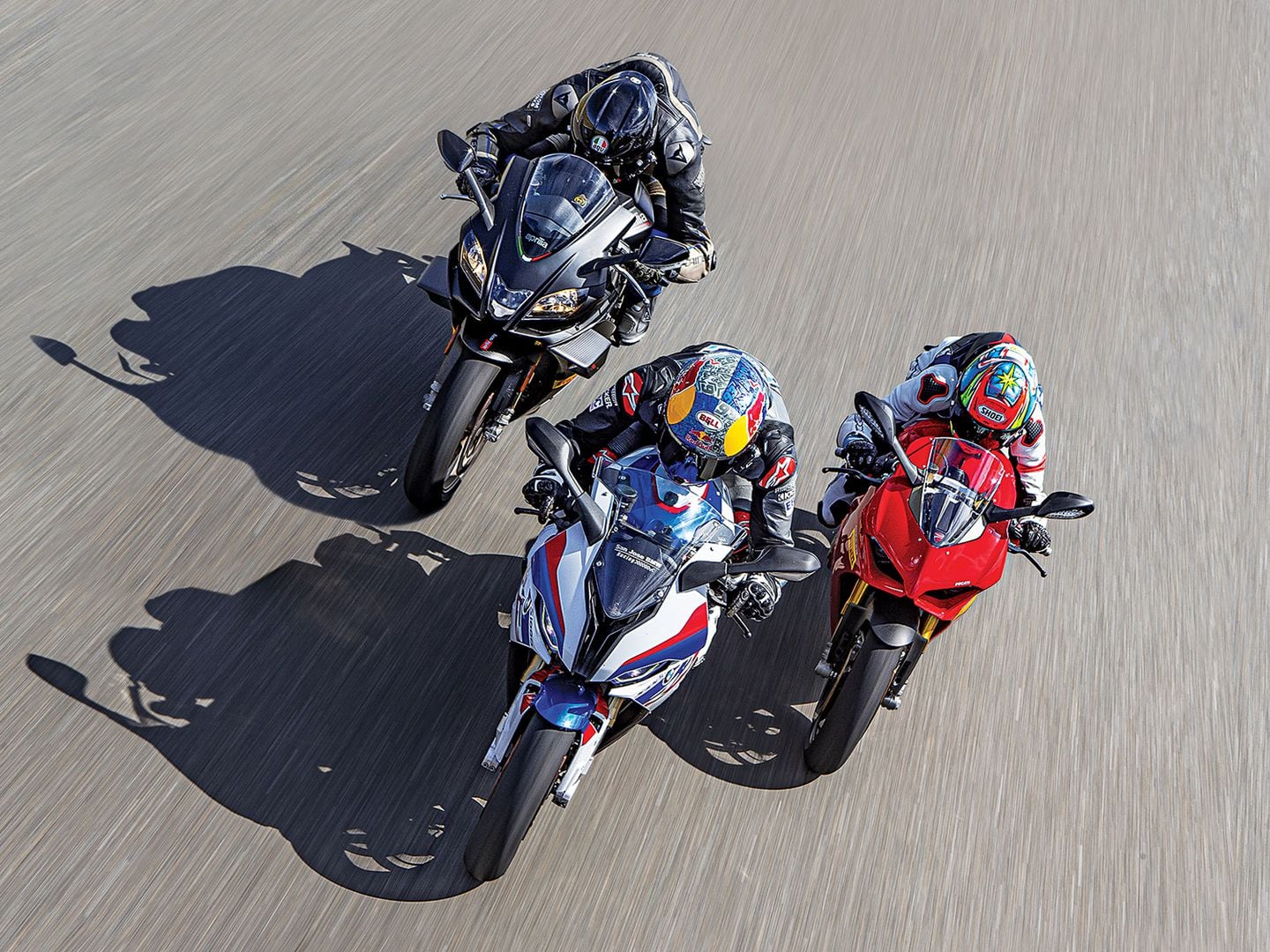 Aprilia RSV4 Factory vs Ducati Panigale V4 S vs BMW M 1000 RR: We Rode All Three Superbikes Back-to-Back on Road and Track to Find the Absolute Best Litre-Class Machine of 2026