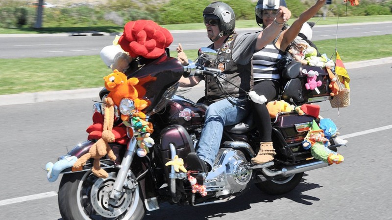 Riders participating in a charity toy run event