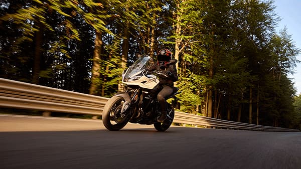 Triumph Tiger Sport 660 on a scenic mountain or canyon road