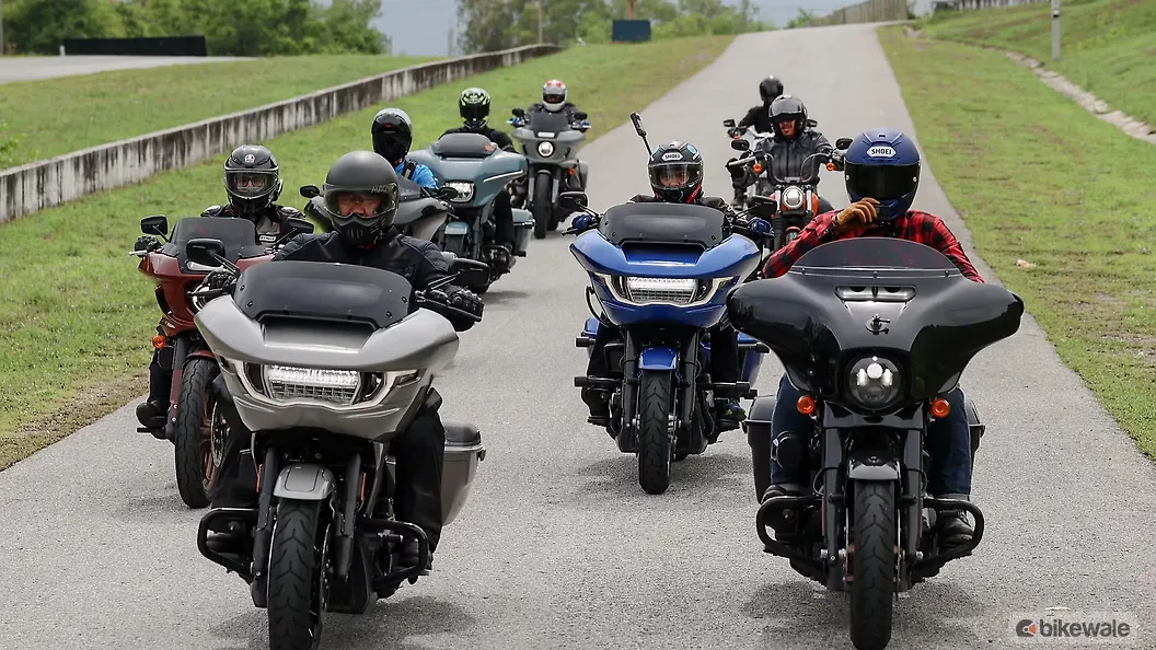 Hero image showing multiple cruiser motorcycles together or a dramatic single cruiser on open road