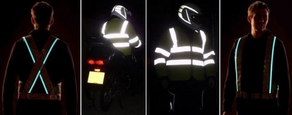 Close-up detail shot of reflective tape on a motorcycle vest at night