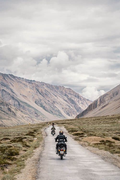Solo tourer on mountain highway to illustrate long-distance riding context