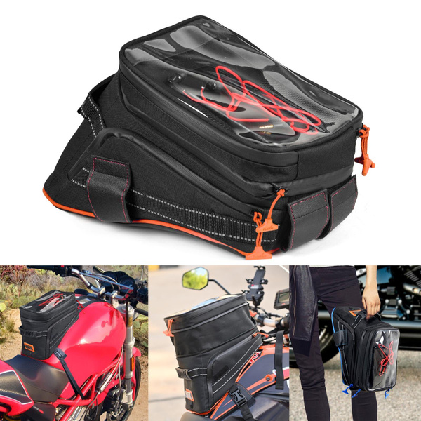 Expandable tank bag shown open with riding gear and items inside