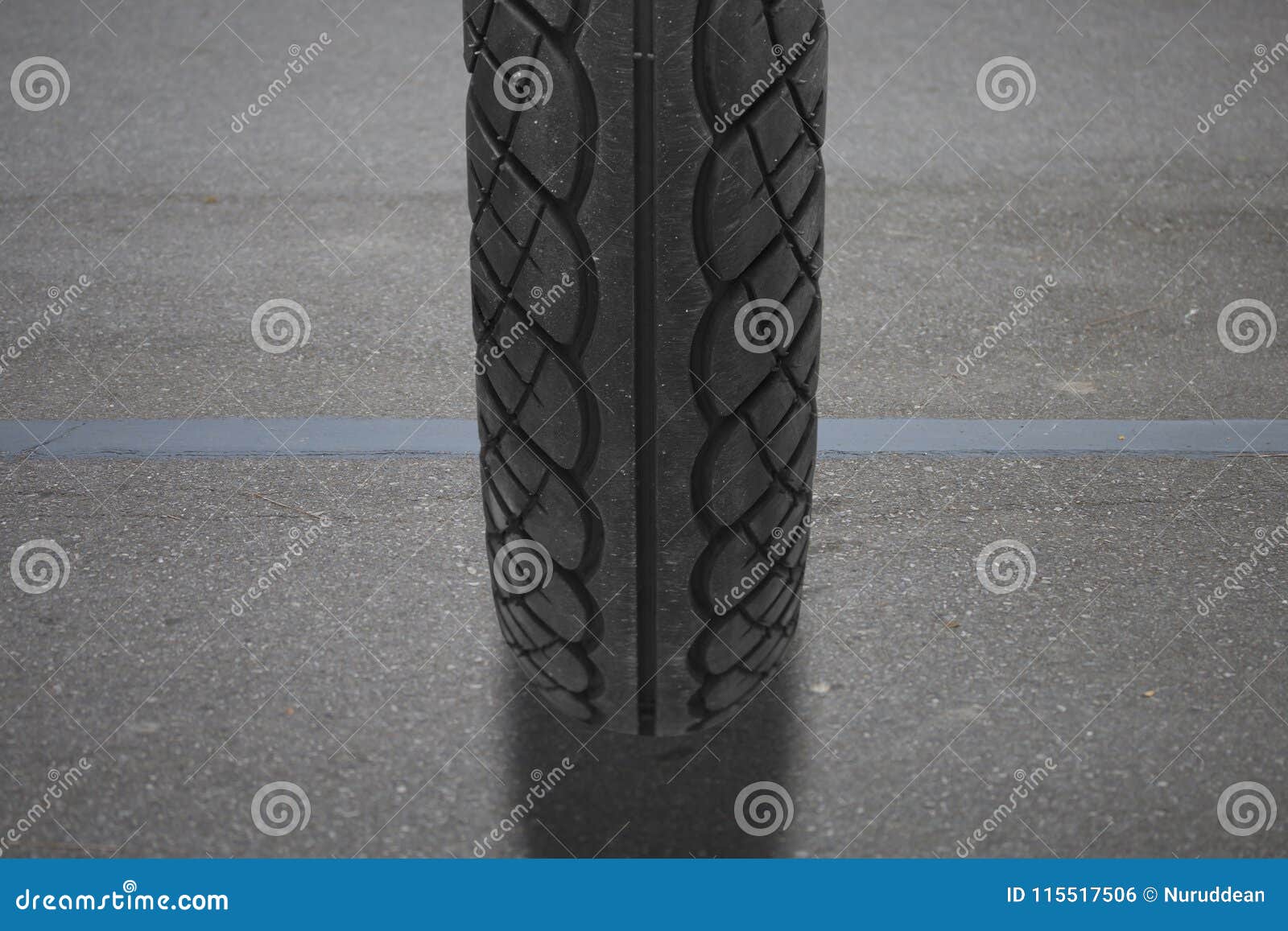 Hero image showing detailed tire tread on pavement