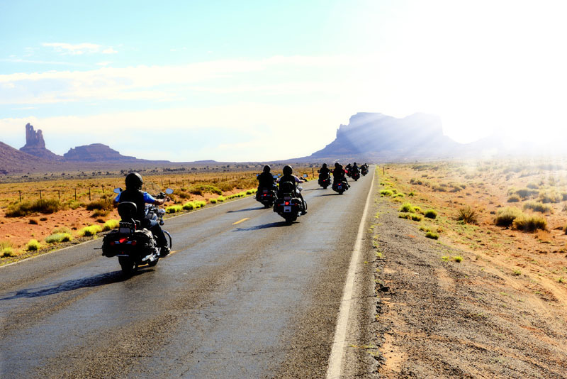 Touring rider on highway representing touring test category