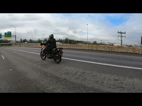 General commuter rider on highway, illustrating daily riding lifestyle