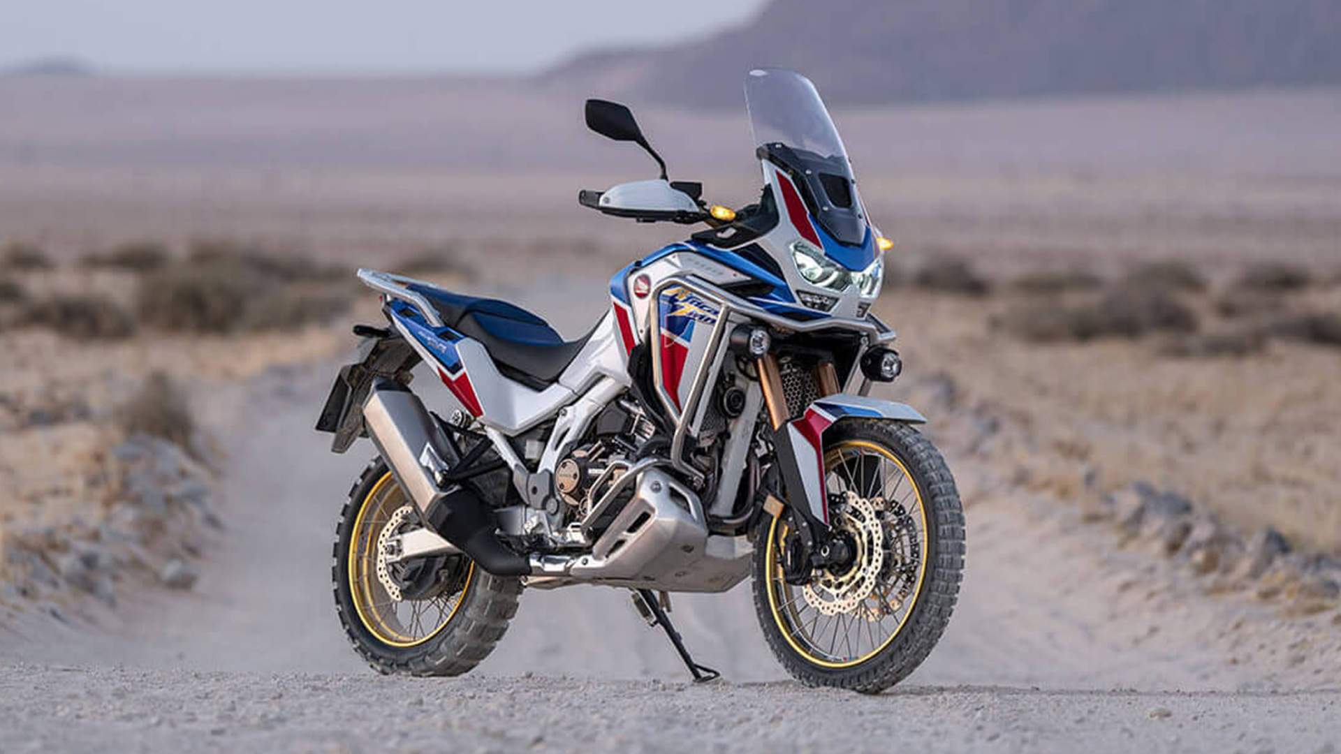 Honda Africa Twin in action on dirt or gravel terrain