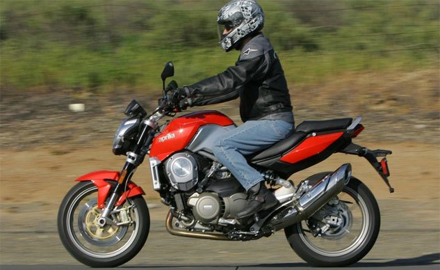 Rider with commuter gear and luggage on urban motorcycle