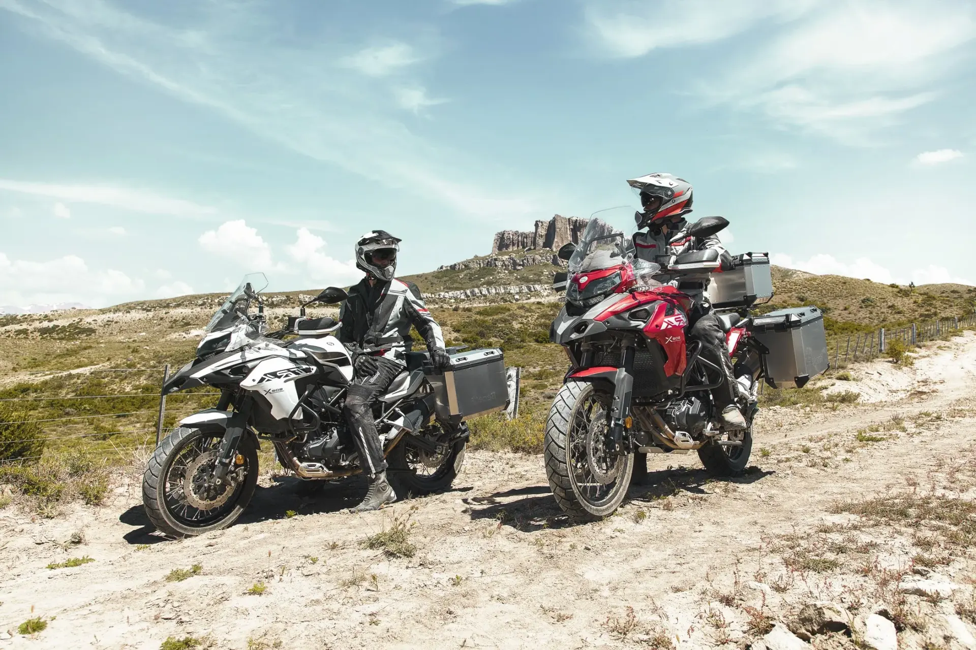 TRK 502 X on a gravel or dirt road to illustrate adventure capability