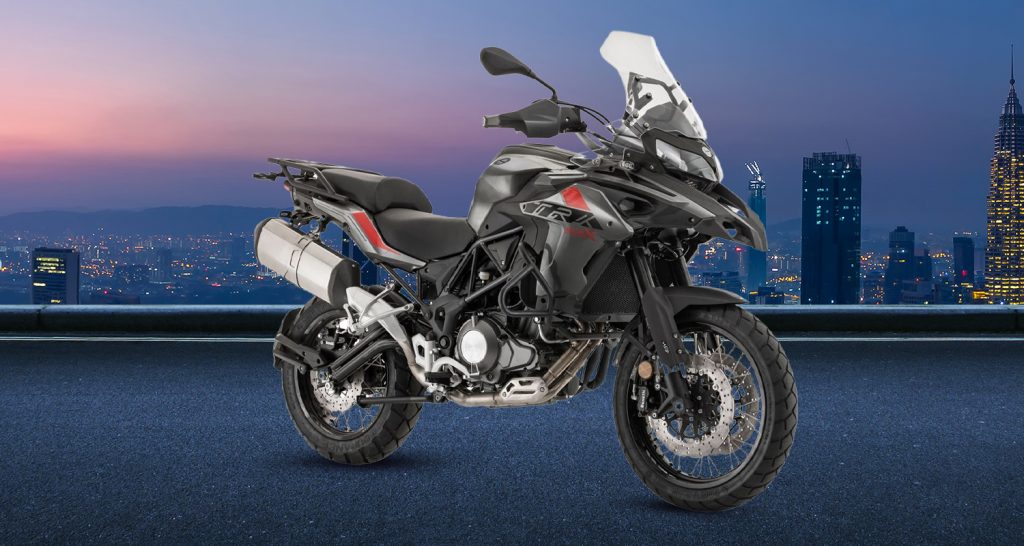 TRK 800 on a highway or mountain road to illustrate touring capability