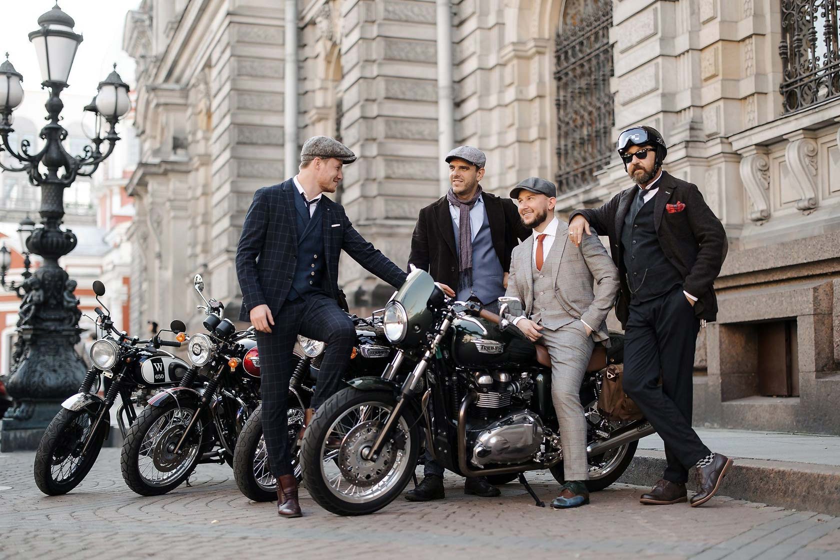 Wide shot of a large DGR procession through an urban street