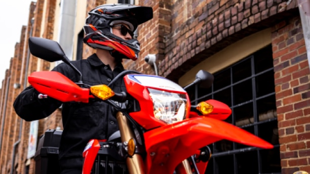 Action shot of a dual sport on dirt trail to illustrate dual sport section