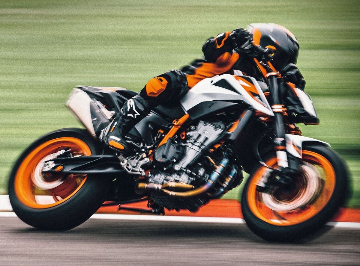 KTM 890 Duke R in aggressive riding stance on road