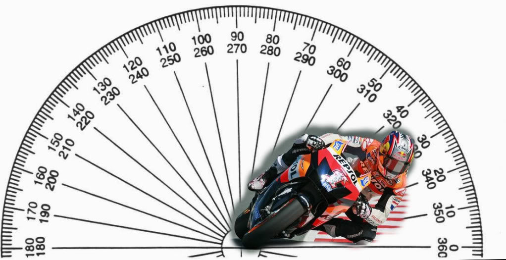 Rider on Hypermotard carving through mountain or canyon roads