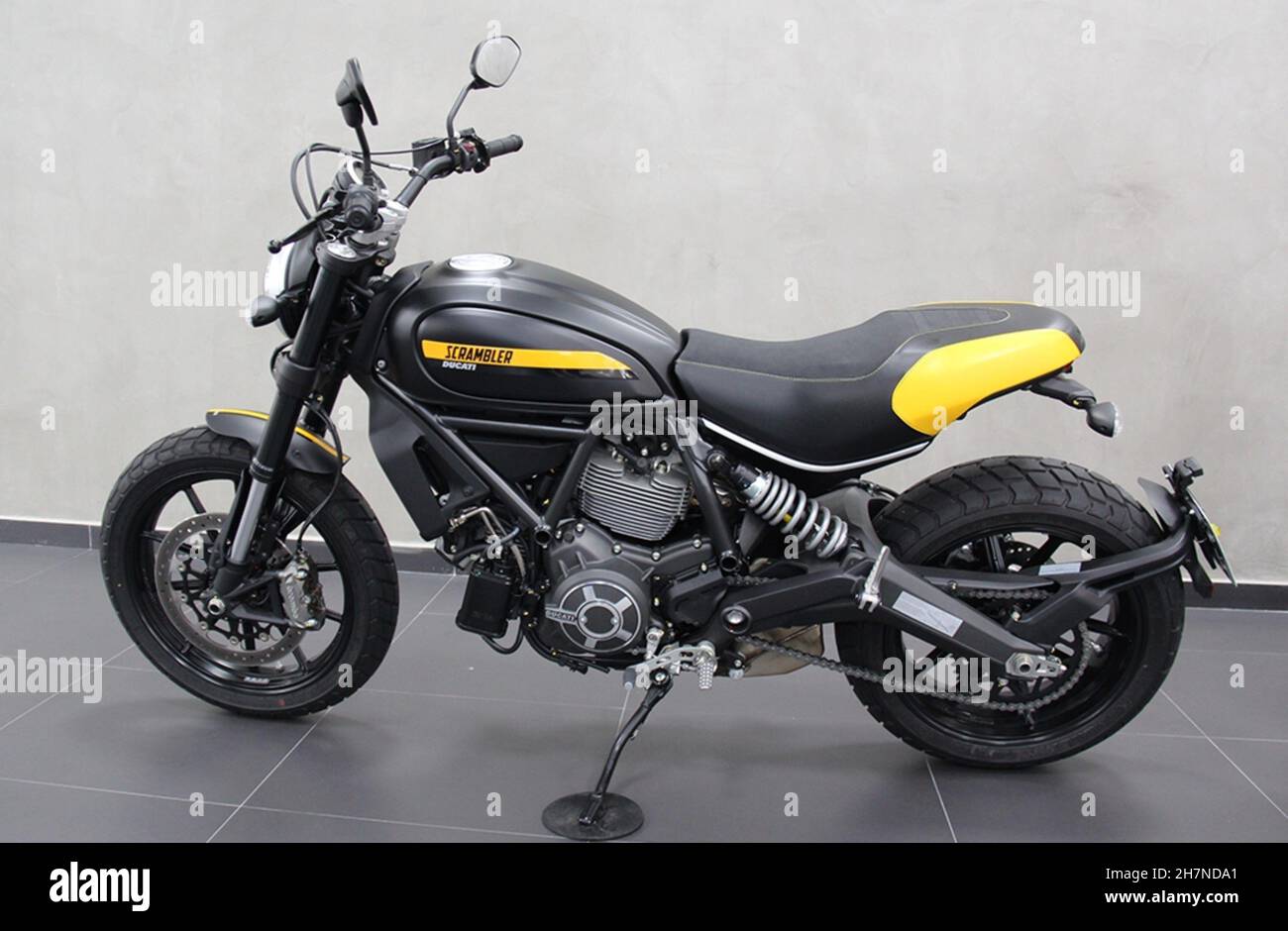 Clean side profile studio image of the Ducati Scrambler Icon