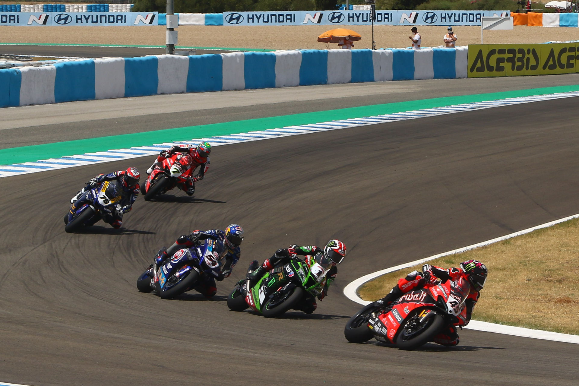 Race 1 action shot showing close racing at Jerez
