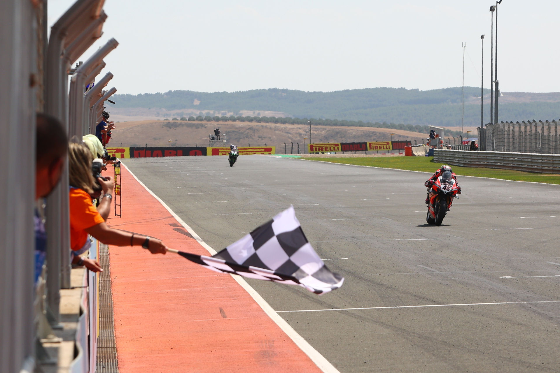 Checkered flag moment at the end of a superbike race