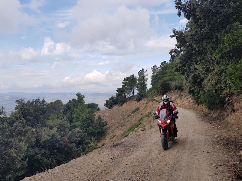 Rider on the Tuareg 660 Factory in Sardinian landscape