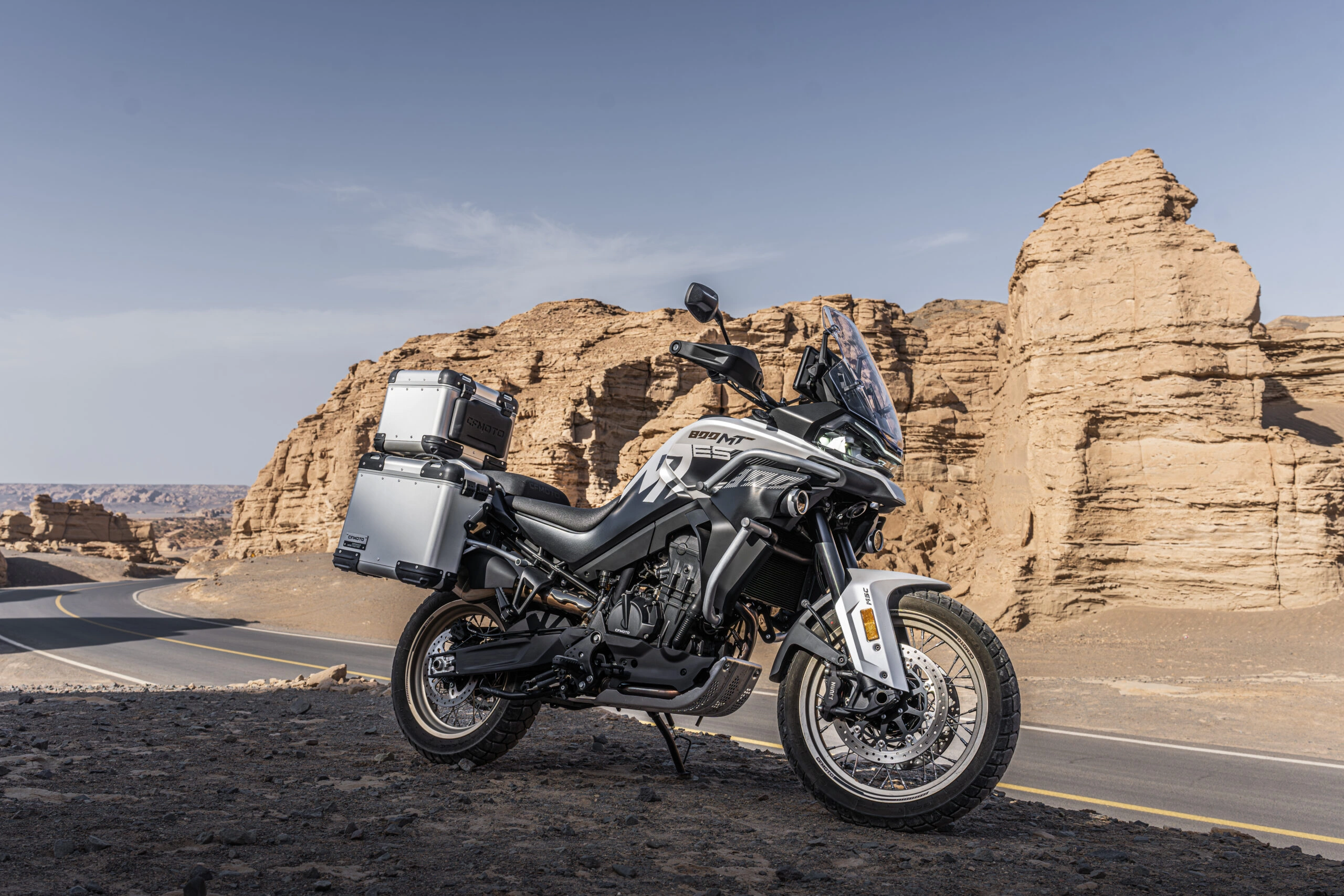Hero image — full side profile of the 2026 CFMoto 800MT Explore on a mountain road