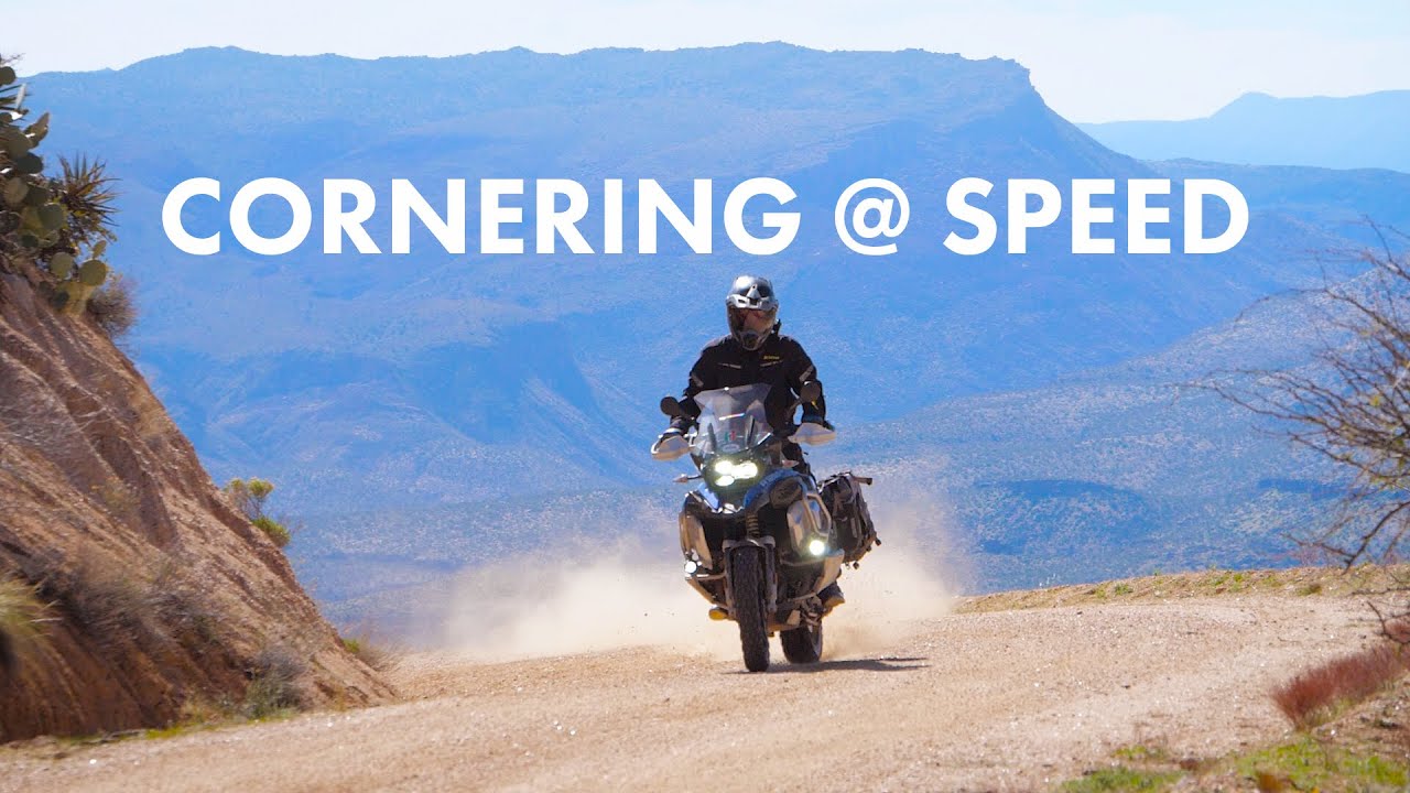 Action shot of Multistrada V4 S cornering on mountain switchbacks