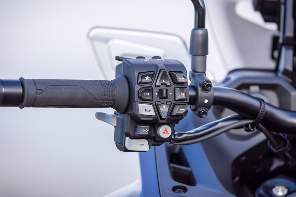 Detail shot of DCT manual mode paddle shifters and controls on handlebar
