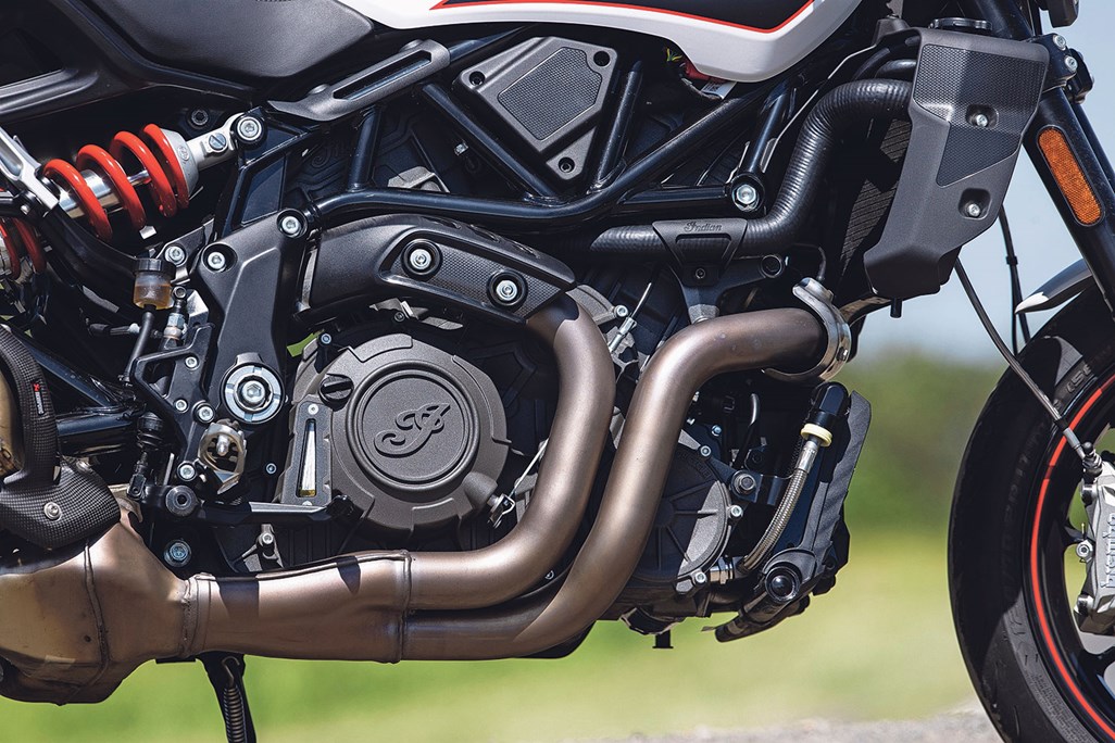 Engine detail shot showing the 1203cc liquid-cooled V-twin