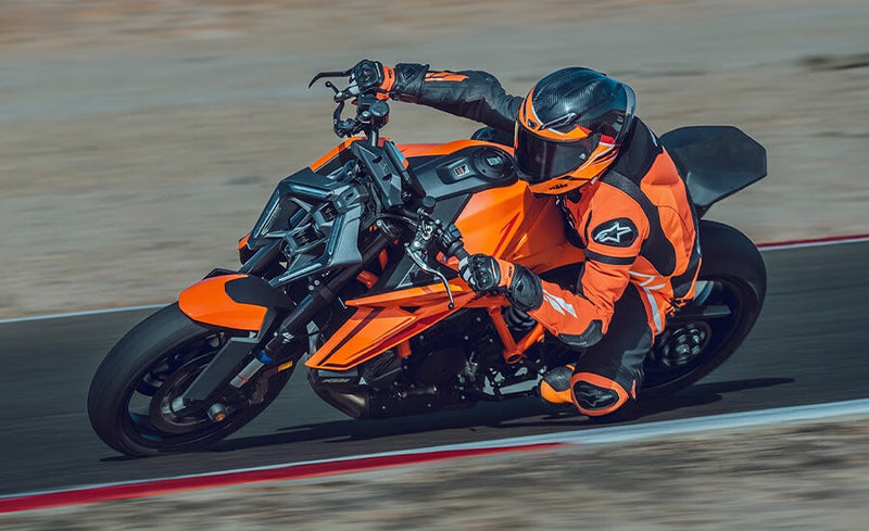 Bike cornering aggressively through a mountain pass to illustrate handling section