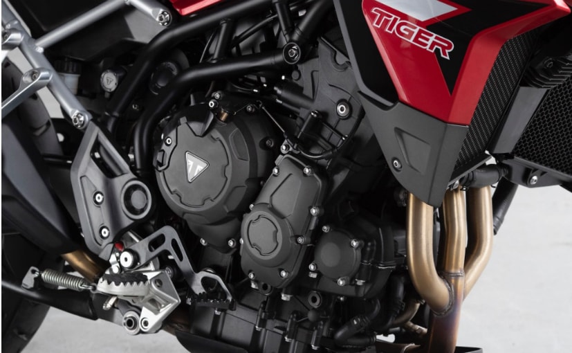 Close-up detail shot of the 888cc triple-cylinder engine to accompany the engine/what's new section