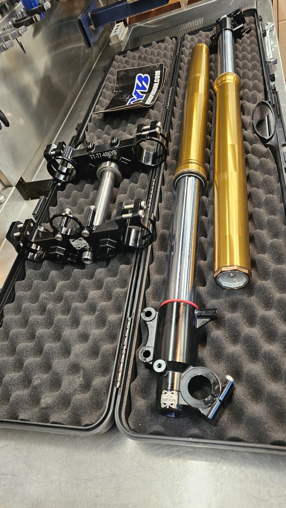 Detail shot of the new KYB inverted front fork and 21-inch wheel