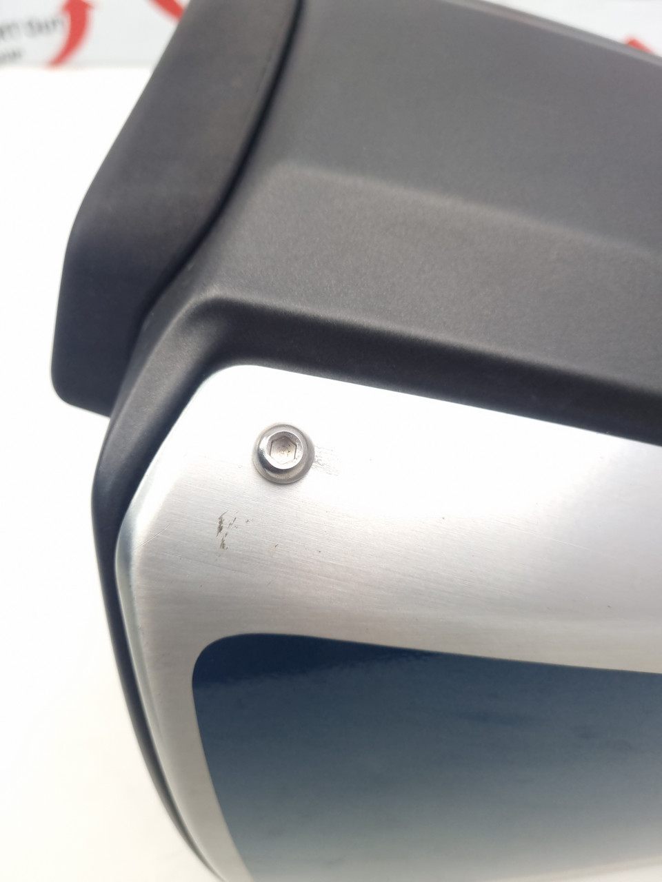 Rear three-quarter view showing tail unit and revised rear cowl