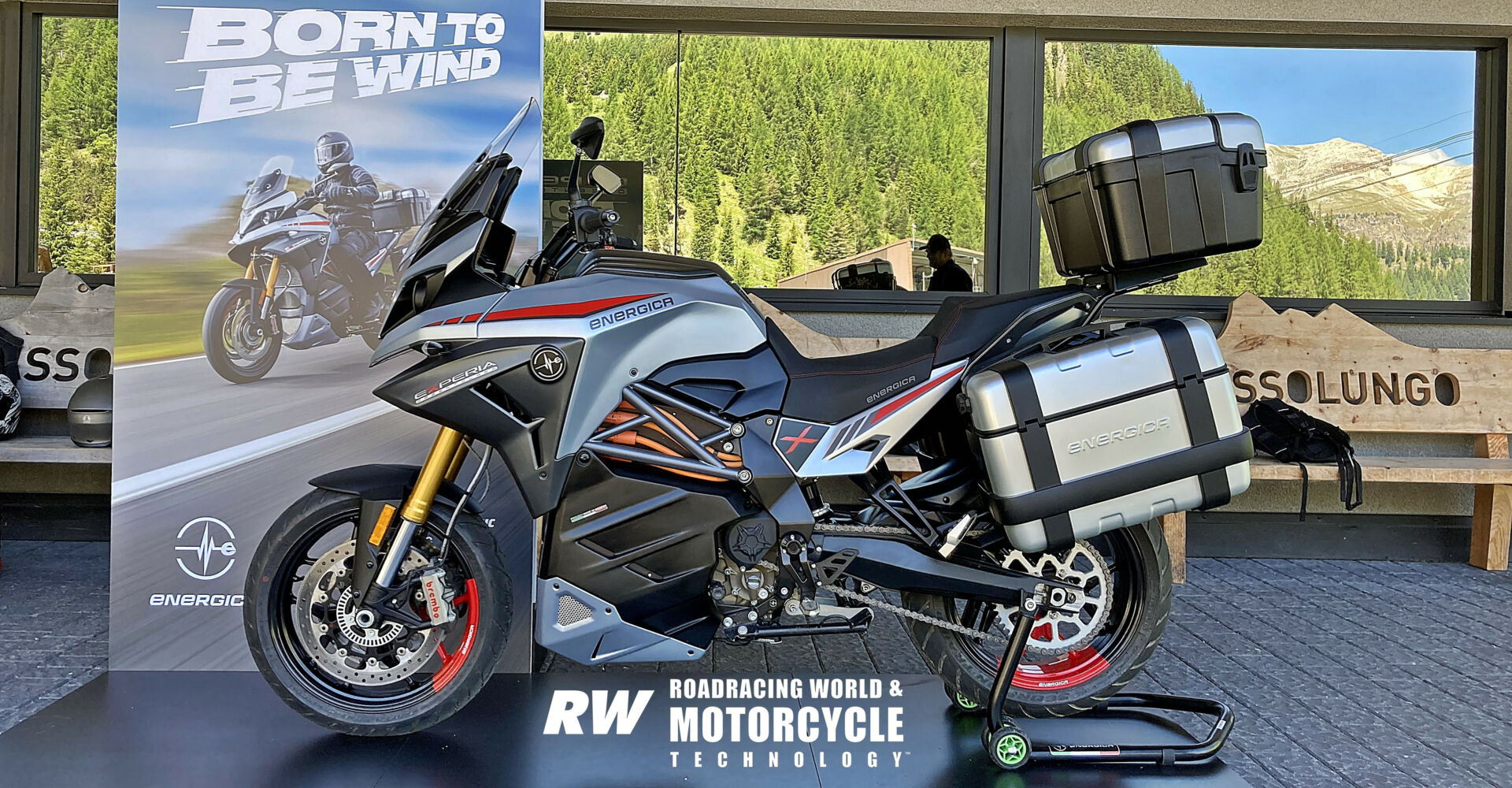 Rider on an electric sport tourer on open highway