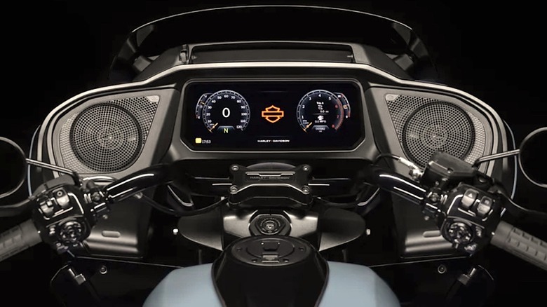 Cockpit view showing the 6.8-inch Skyline OS touchscreen