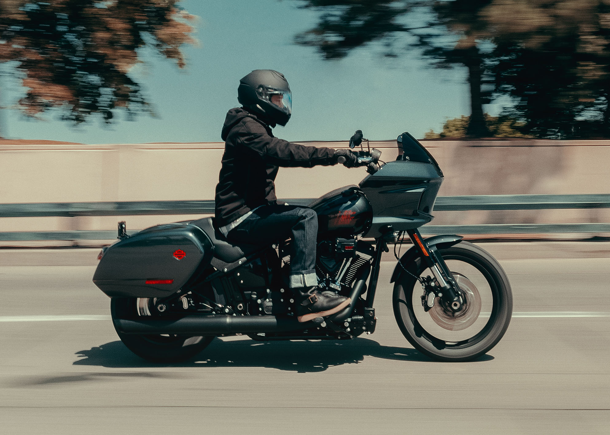 Action shot of rider on Low Rider ST on open highway