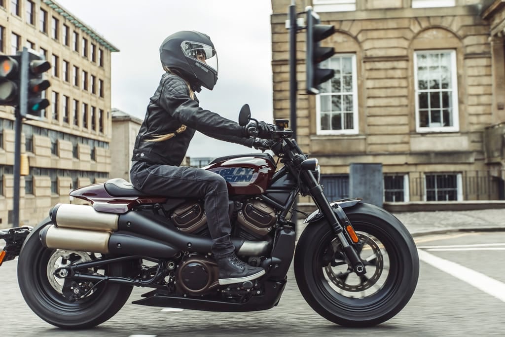 Action shot of rider on Sportster S in an urban environment