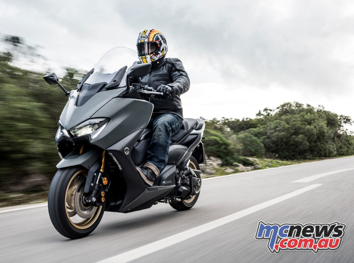 TMAX 560 with passenger showing comfort and practicality