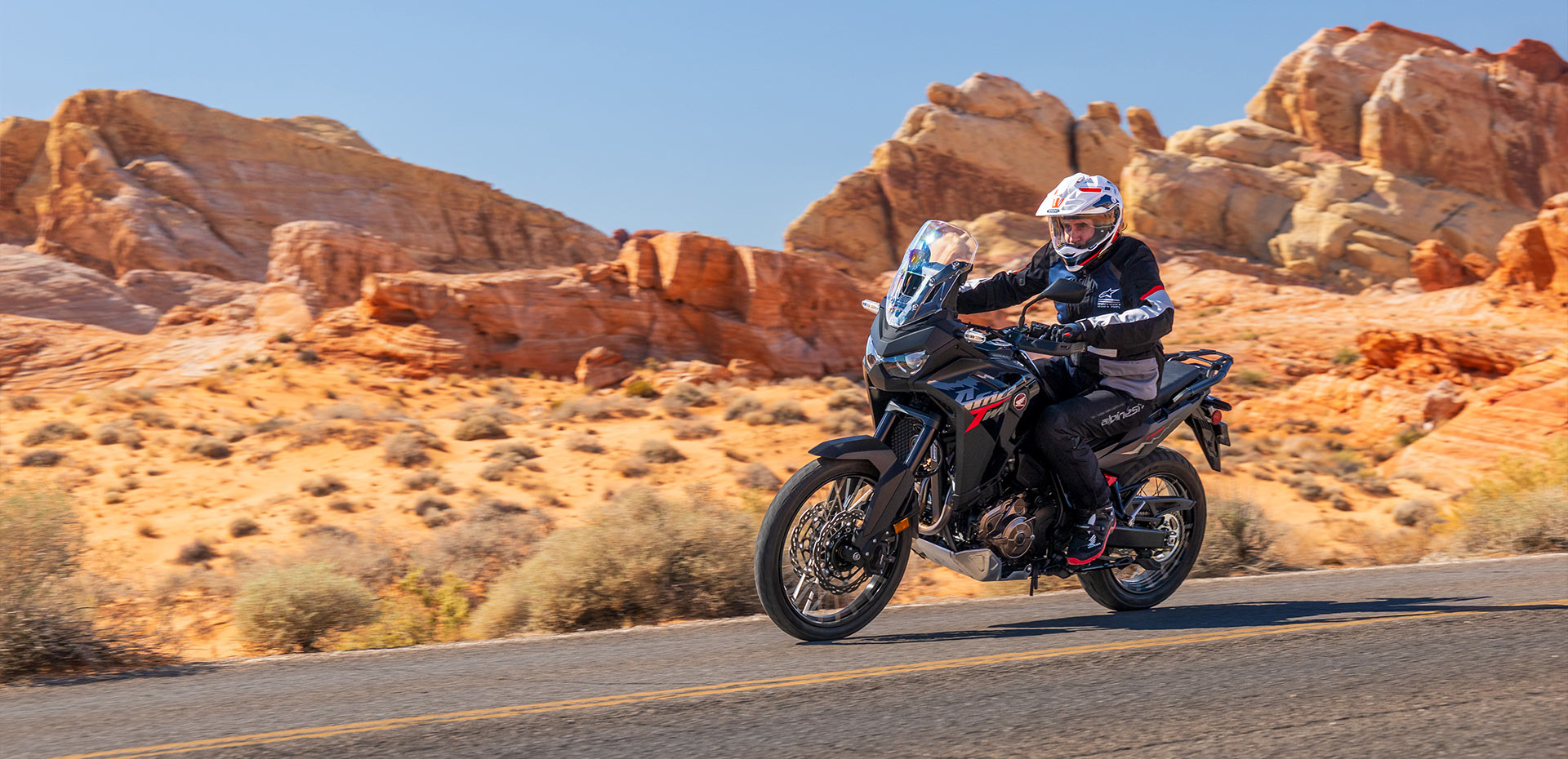 Africa Twin on scenic adventure road to illustrate the adventure platform discussion