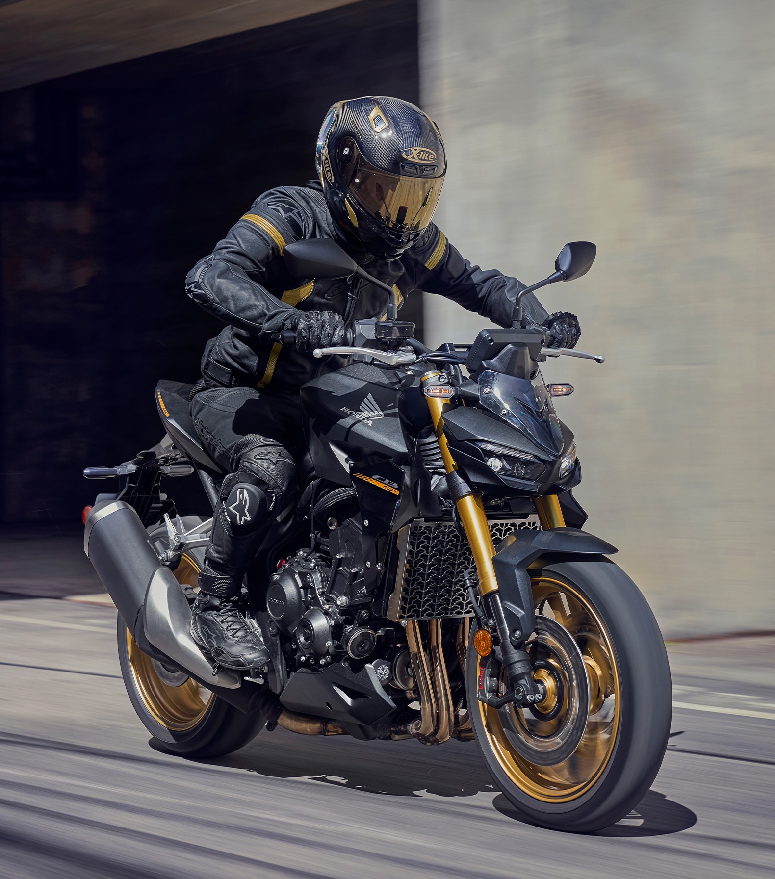 Dynamic riding shot of Hornet SP on road or track