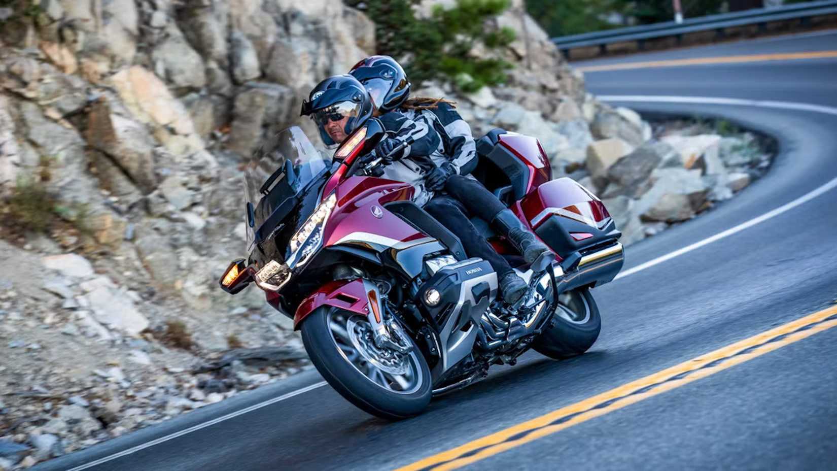 Rider on Gold Wing Tour on open highway, showcasing touring capability