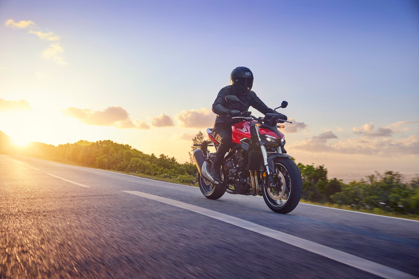 Dynamic riding shot on a winding road