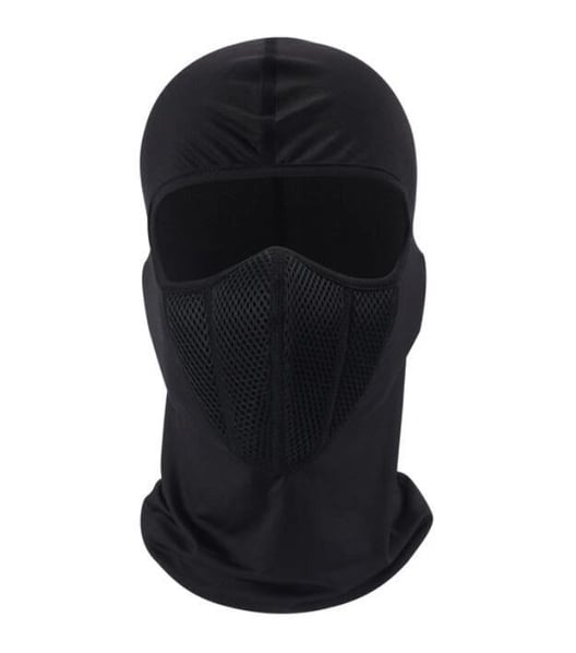 Rider wearing a balaclava under a full-face helmet preparing for a cold-weather ride