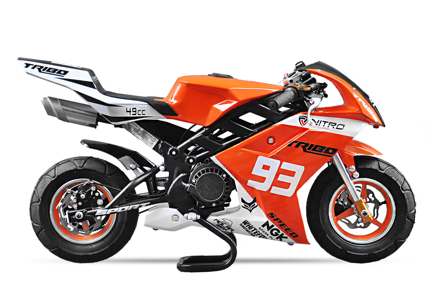 Kids racing pocket bikes on a small circuit