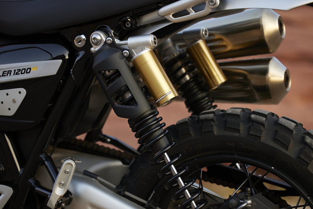 Detail shot illustrating suspension differences across the class