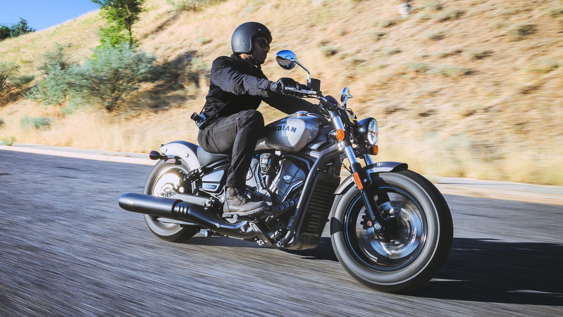 Dynamic riding shot of Indian Scout on open road