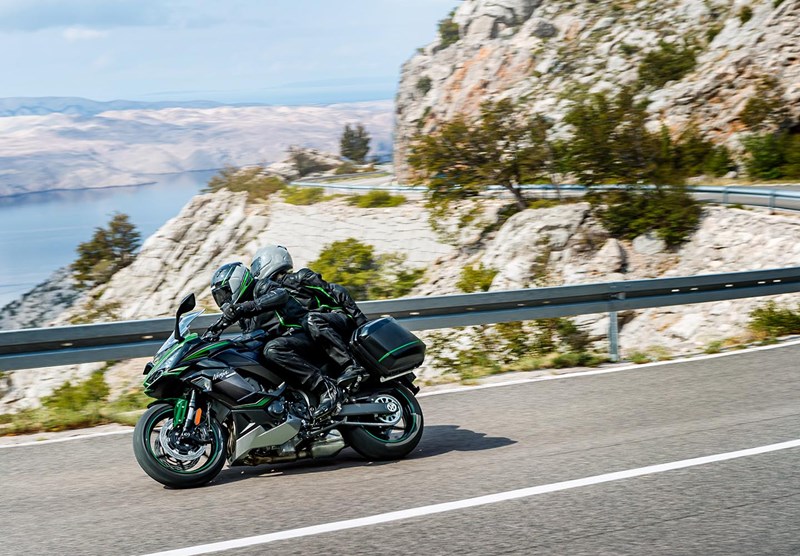 Ninja 1000SX being ridden on a winding mountain pass