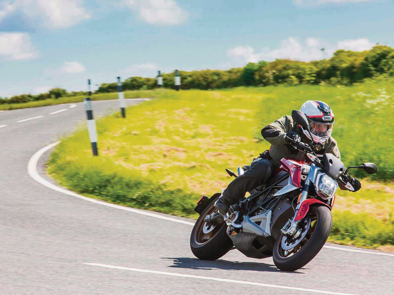 Dynamic riding shot of naked sportbike in corner