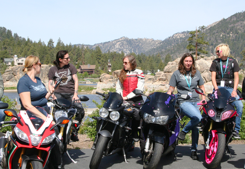 Female riders at a motorcycle rally or women riders summit event