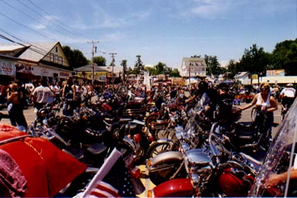 Hero image showing the iconic Weirs Beach scene during Laconia Motorcycle Week