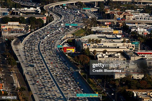 Aerial or wide shot of LA freeway gridlock to illustrate commuting context